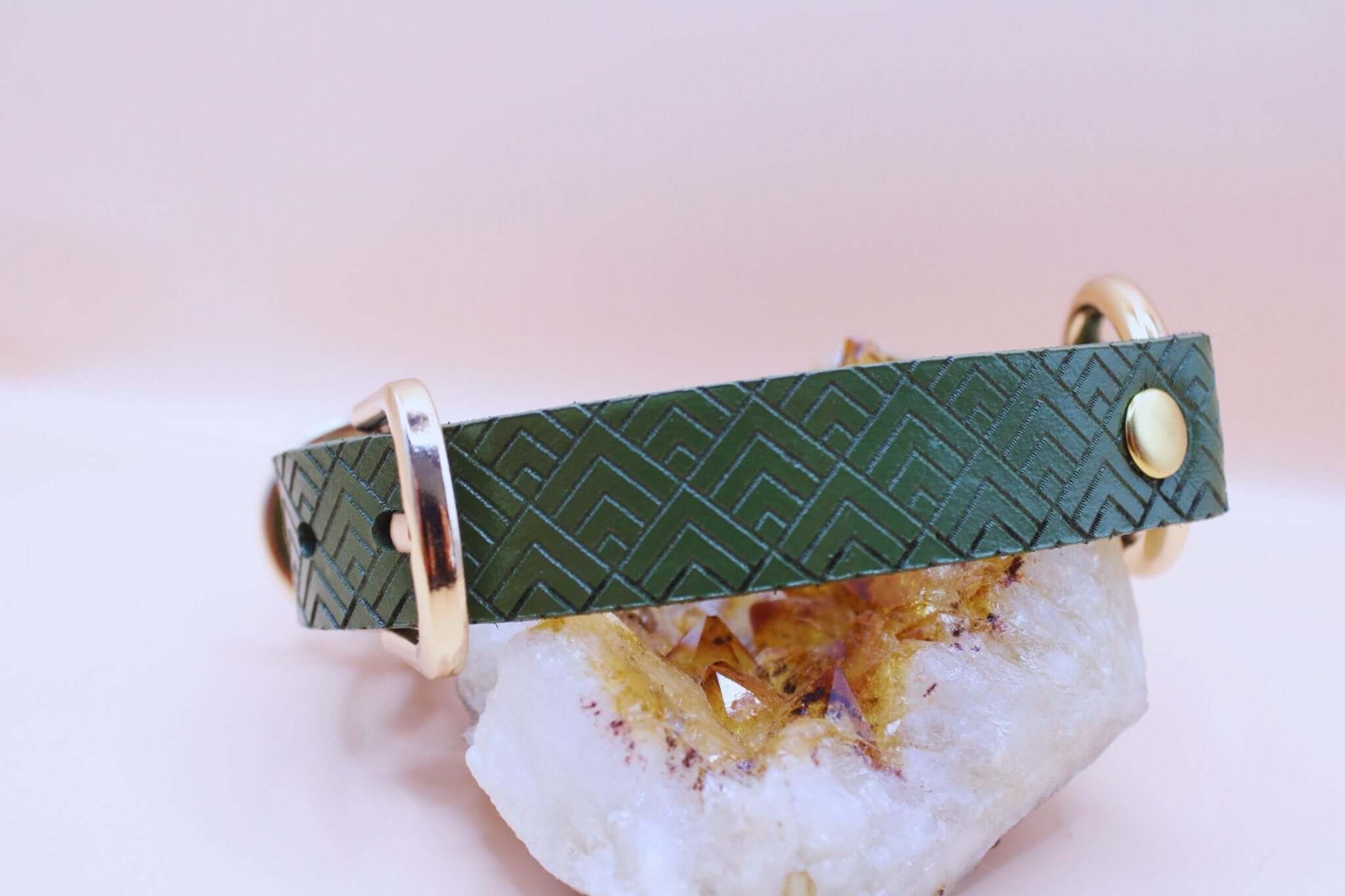 Green geometric leather slave collar with gold accents, perfect for BDSM jewelry and submissive day wear.