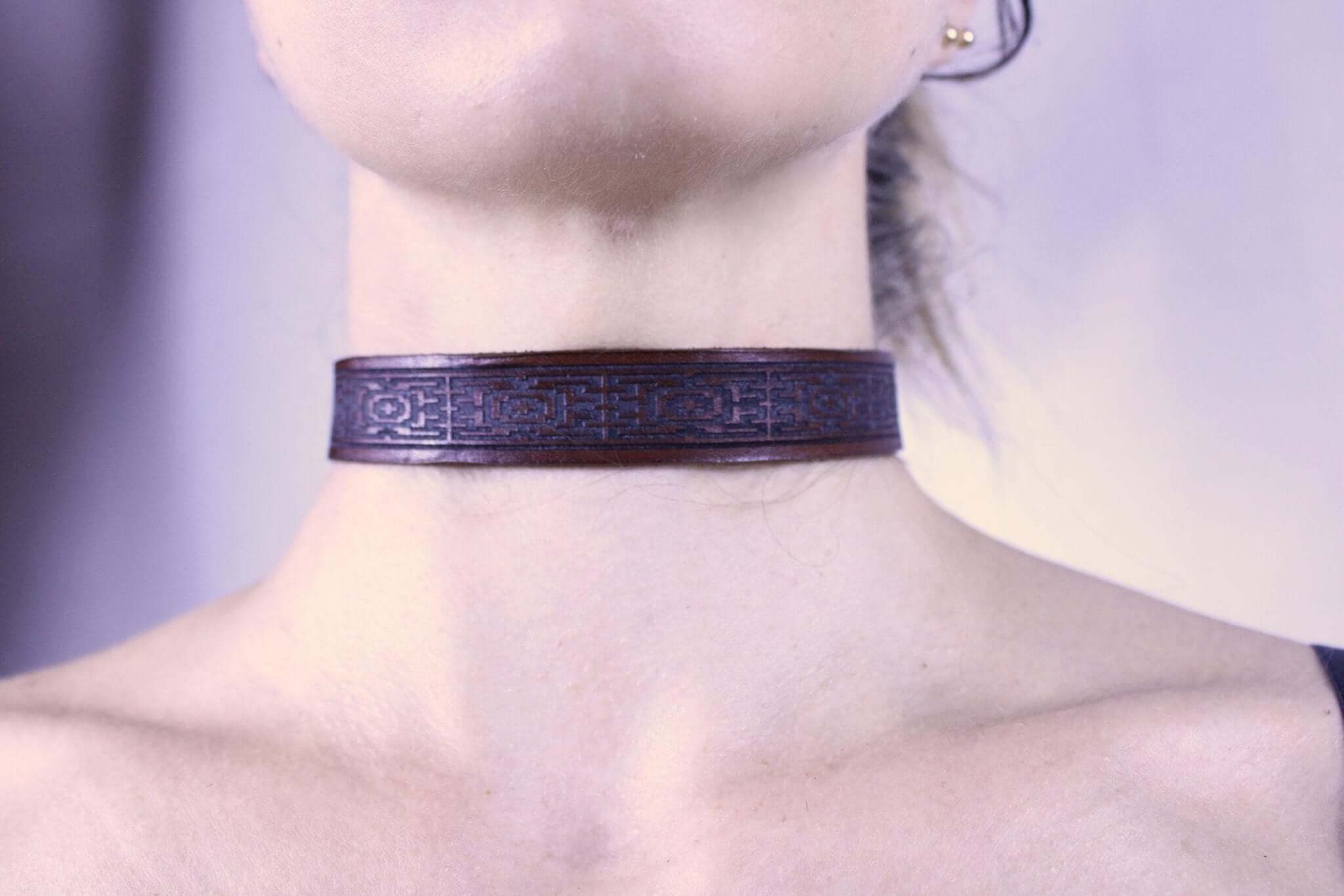Handcrafted leather submissive collar with geometric pattern for BDSM and dom sub gifts, elegant bondage jewelry.