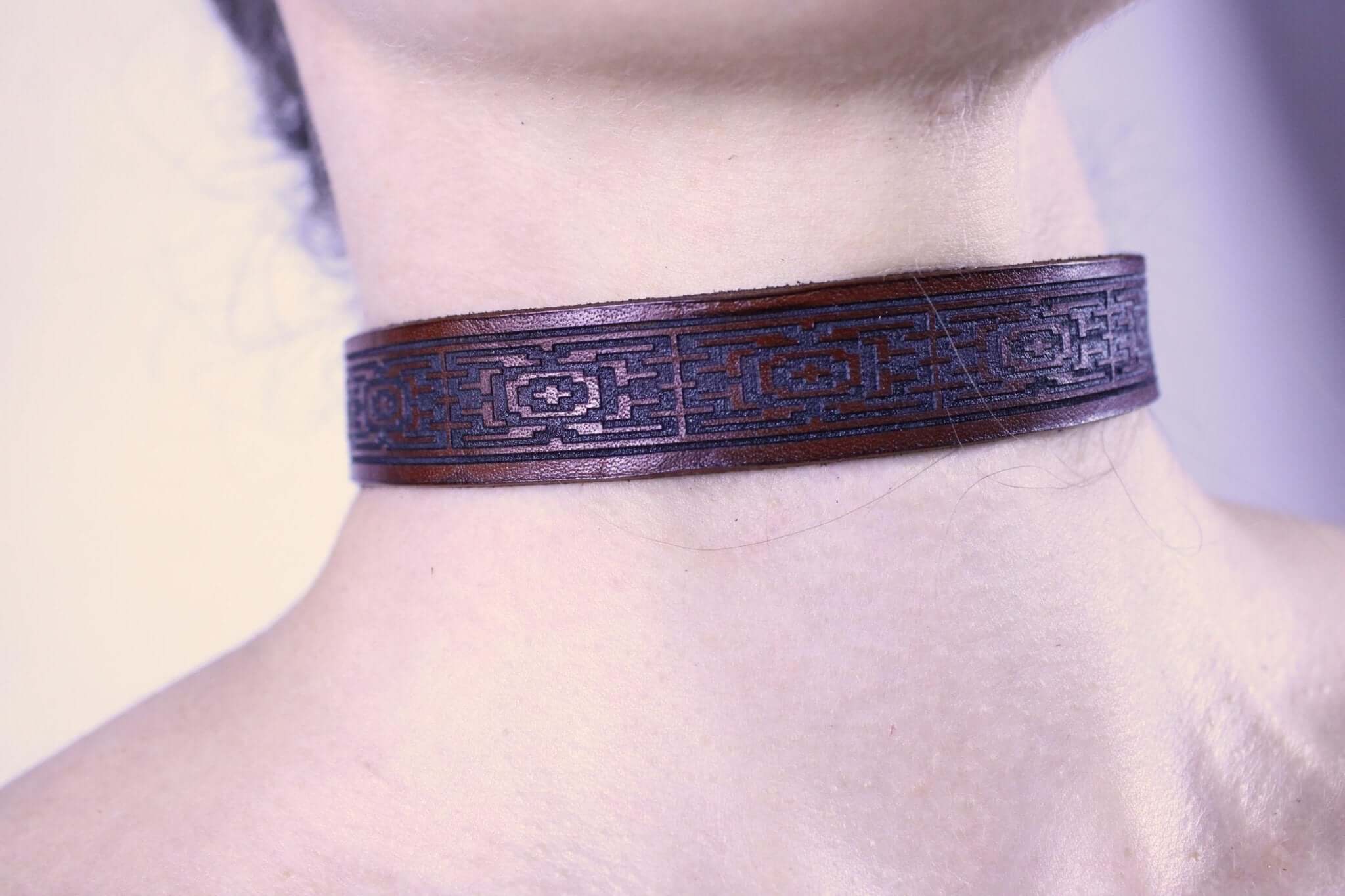 Handcrafted leather sub collar with geometric pattern, perfect for BDSM jewelry and discreet day collar.