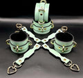 Handmade mint green leather cuffs and connector for BDSM play, ideal for wrist or ankle restraint, adjustable and comfortable.