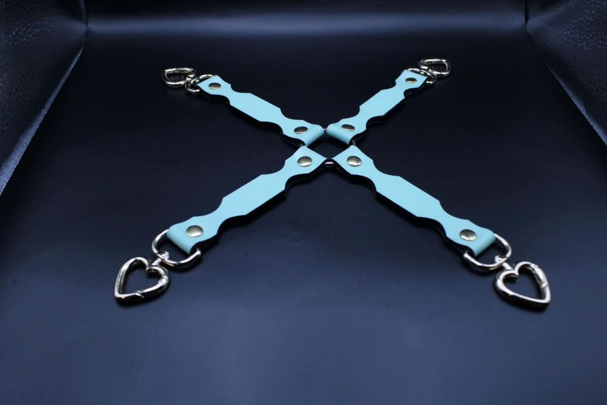 Handmade BDSM bondage connector with heart-shaped clips, perfect for secure wrist or ankle restraints in bondage play.