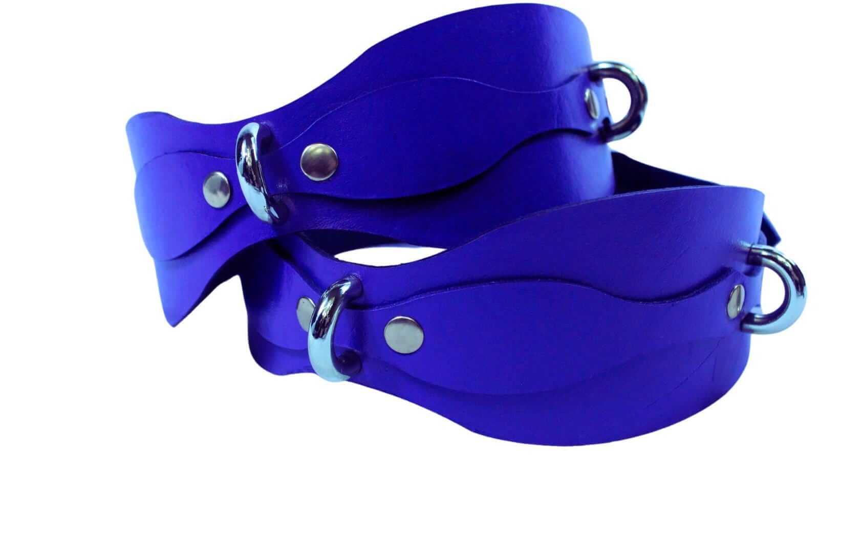 Handmade purple leather thigh cuffs for bondage, adjustable and perfect for BDSM play and erotic lingerie accessories.