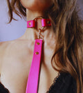 Vibrant neon pink submissive collar with gold-tone hardware, perfect for discreet BDSM day wear and edgy style.