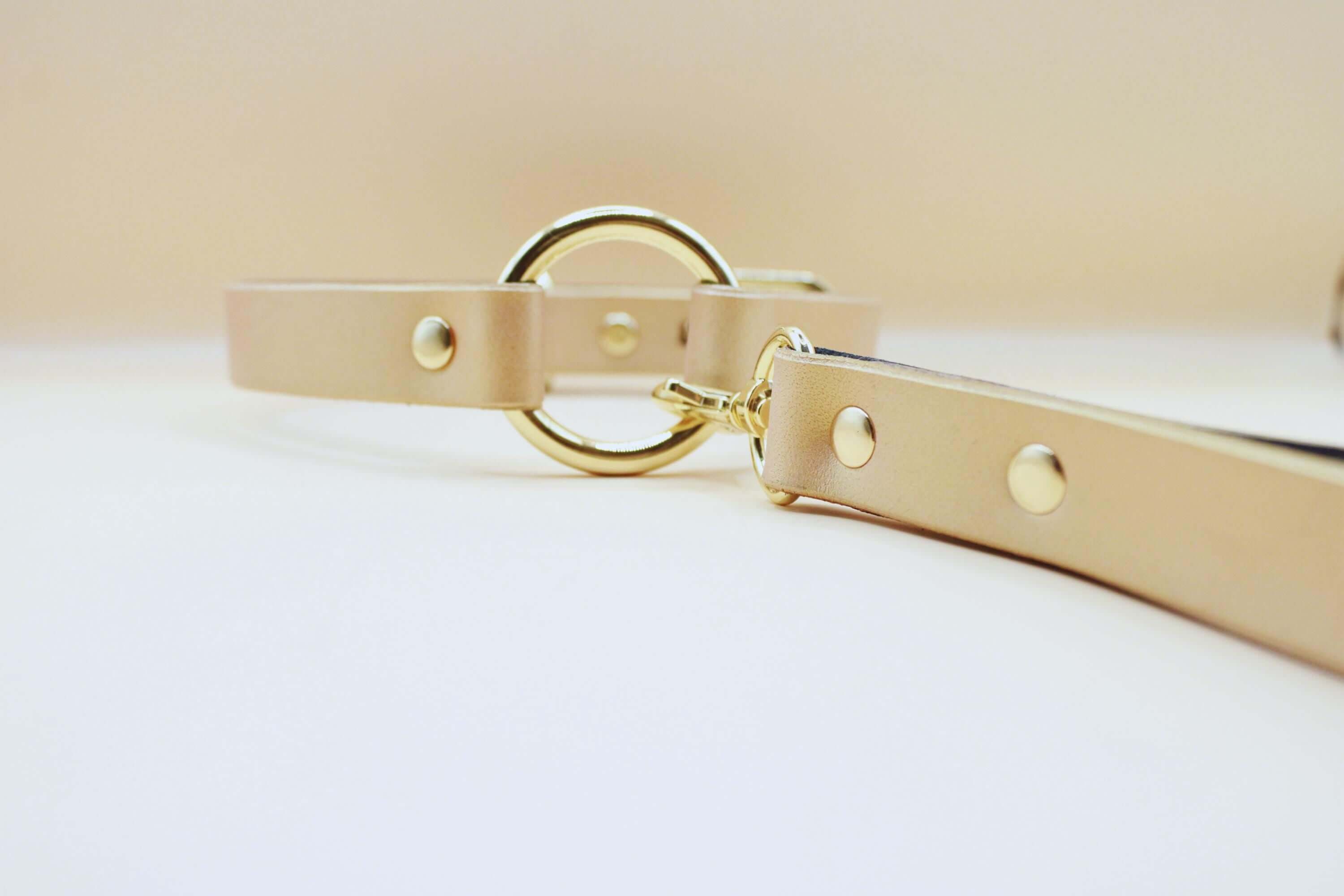 Pearl Rose O-Ring Choker collar with gold hardware, perfect for BDSM, discreet day wear, and submissive jewelry.