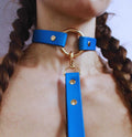 Blue leather submissive collar with gold hardware, perfect for discreet BDSM jewelry and everyday wear.