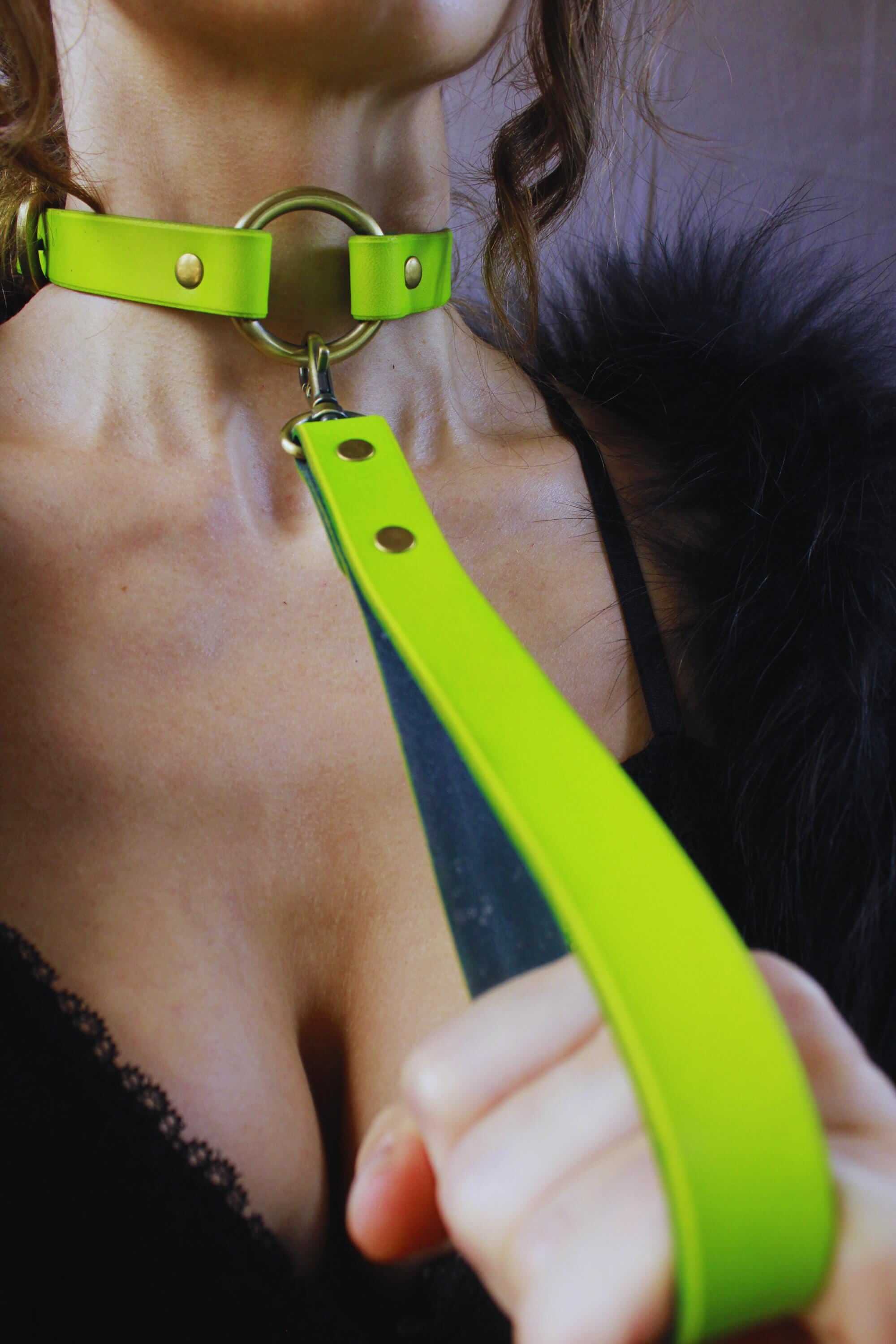 Mini BDSM leash attached to a bright green submissive collar, perfect for bondage gear and ddlg dynamics.