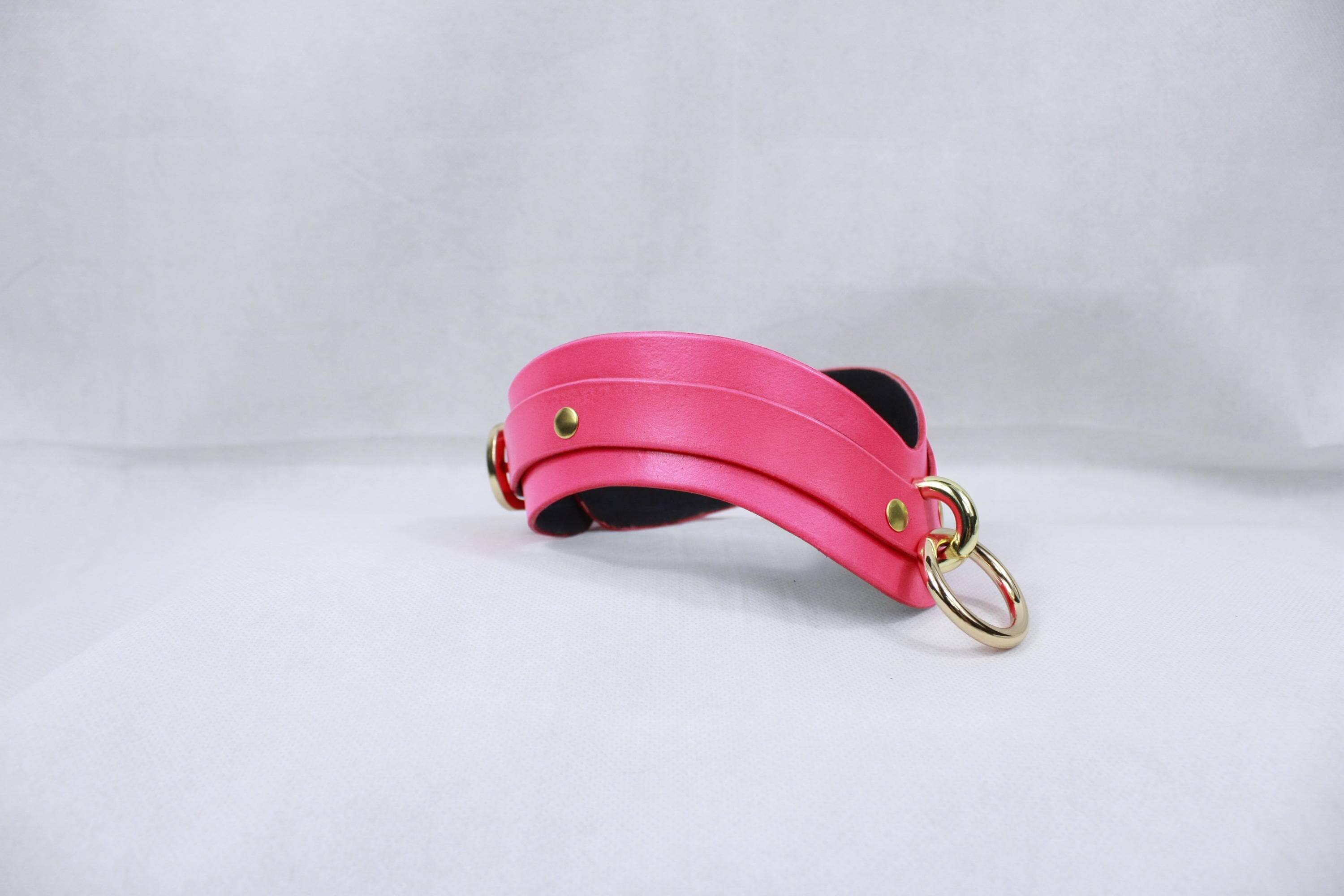 Elegant pink BDSM collar, a discreet day collar for submissive play, perfect for stylish bondage jewelry and dom-sub dynamics.