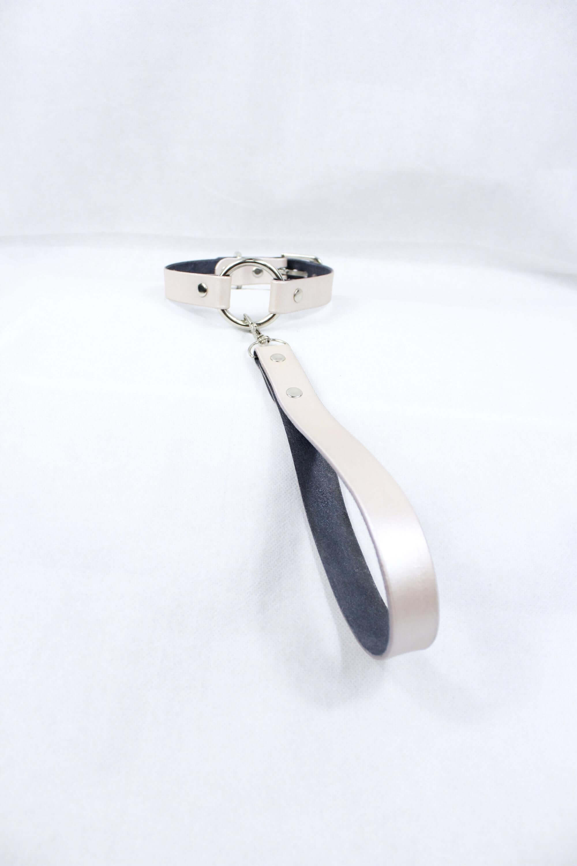 Elegant pearl silver leather BDSM collar with leash, perfect for discreet day wear and bondage accessories.