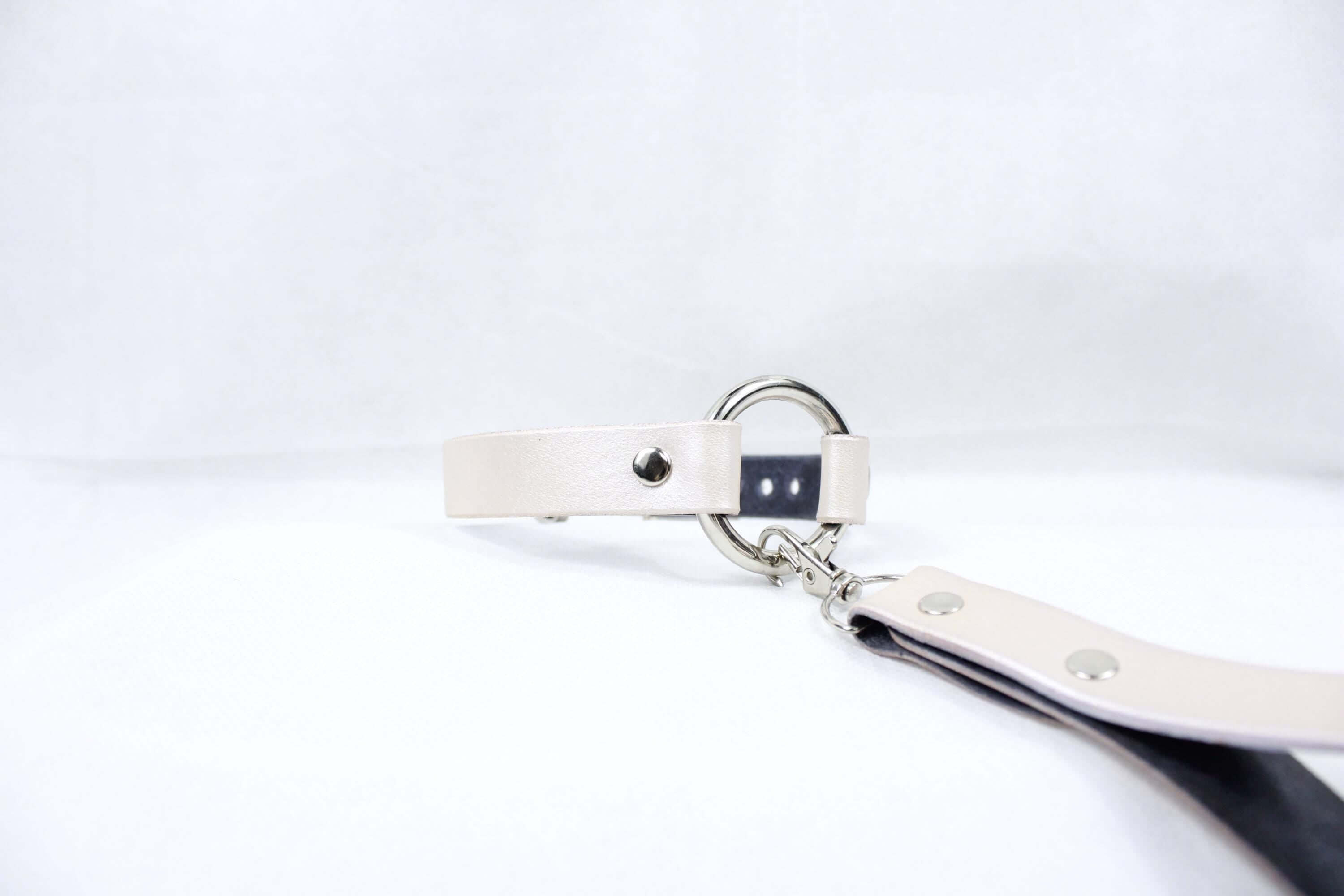 Elegant pearl silver leather collar with ring, perfect for discreet sub wear and BDSM day use, showcasing style and comfort.