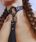 Leather BDSM collar with leash, featuring a sleek design for submissive jewelry and discreet day wear.