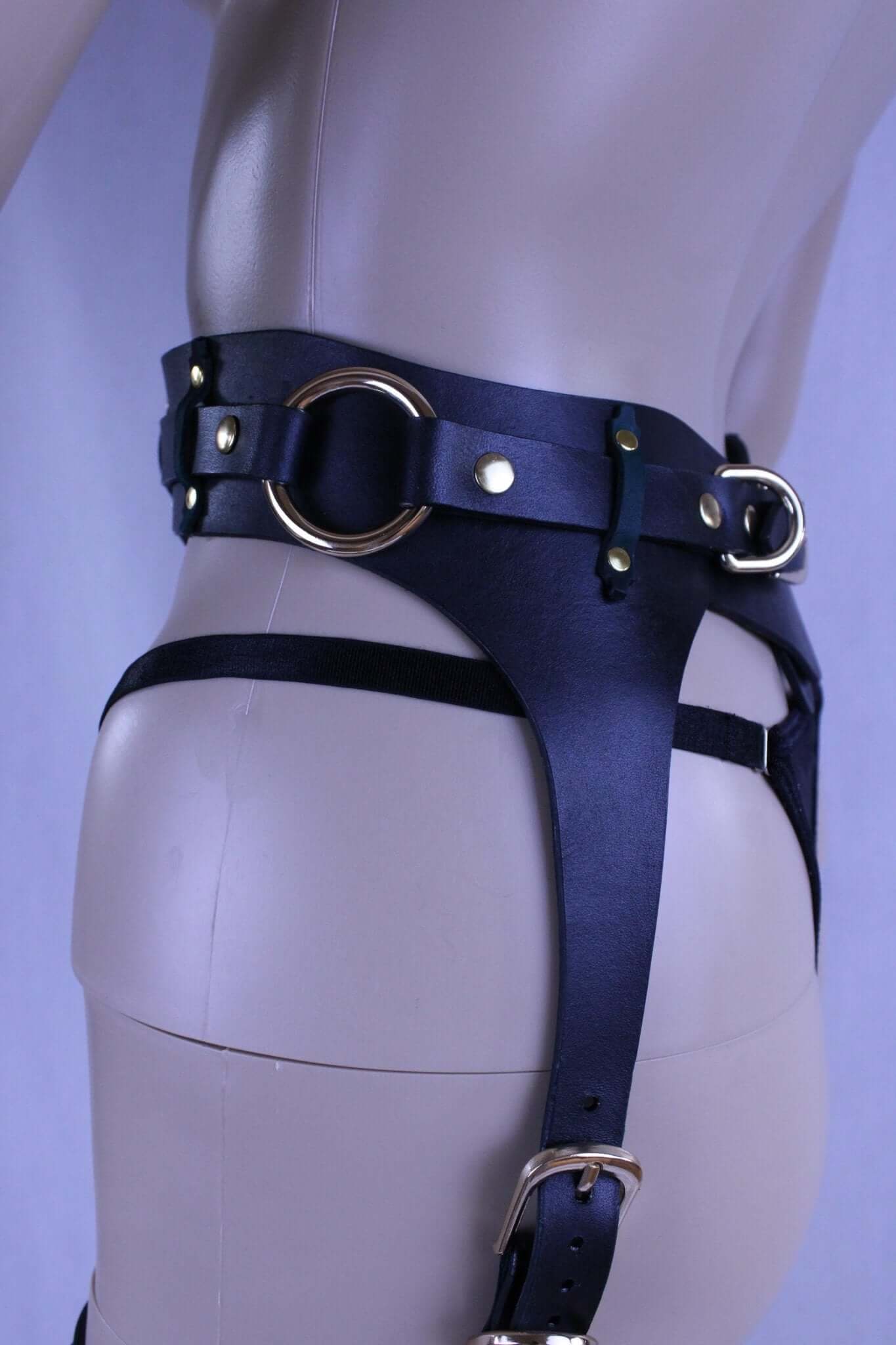 Italian leather thigh harness set showcasing adjustable straps, perfect for bondage gear and submissive outfits.