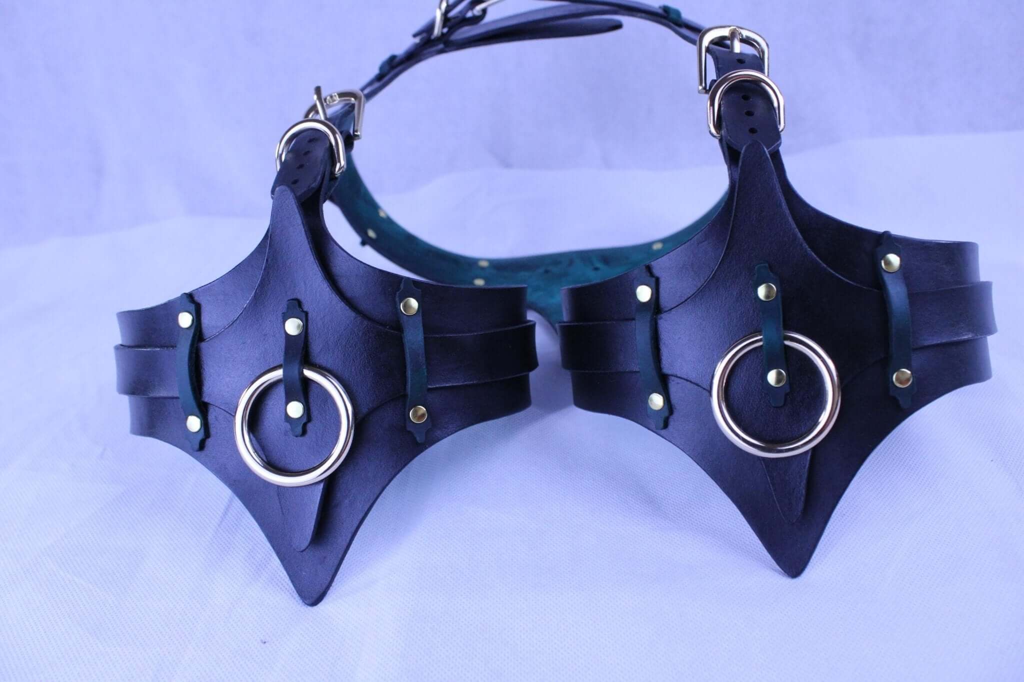 Italian leather thigh harness set featuring sleek design and metal accents, perfect for bondage and erotic lingerie.