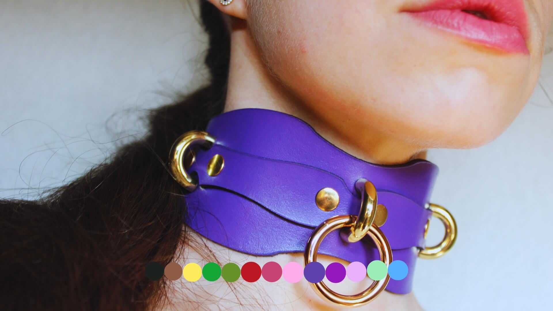 Purple leather D/s collar with gold rings, perfect for BDSM play and submissive jewelry.