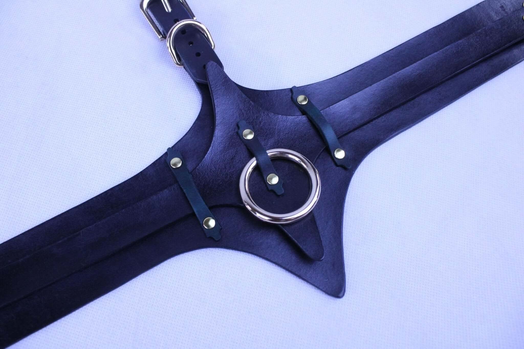 Leather bondage harness with metal ring and straps, ideal for BDSM enthusiasts and bondage lingerie lovers.