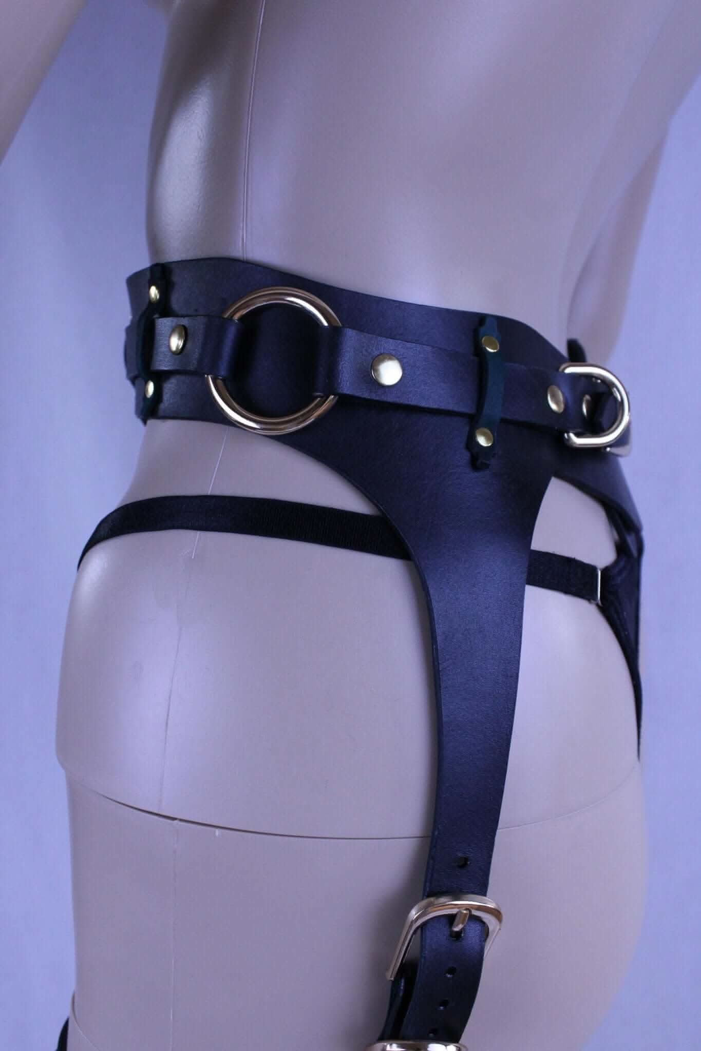 Leather bondage harness with thigh cuffs, perfect for BDSM, erotic lingerie, and submissive wear.
