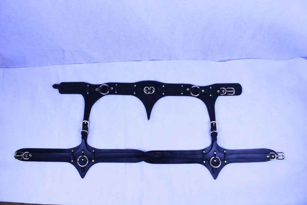 Luxurious leather bondage harness with adjustable thigh cuffs, perfect for BDSM and erotic lingerie enthusiasts.