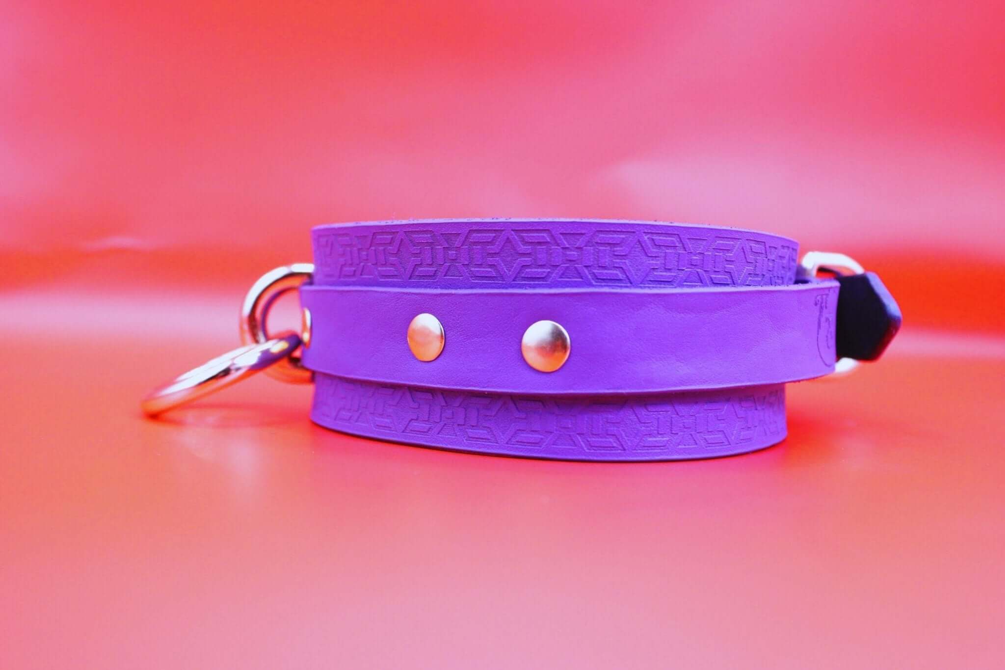Handcrafted violet leather choker collar, discreet BDSM gear for submissive jewelry and day collar wear.