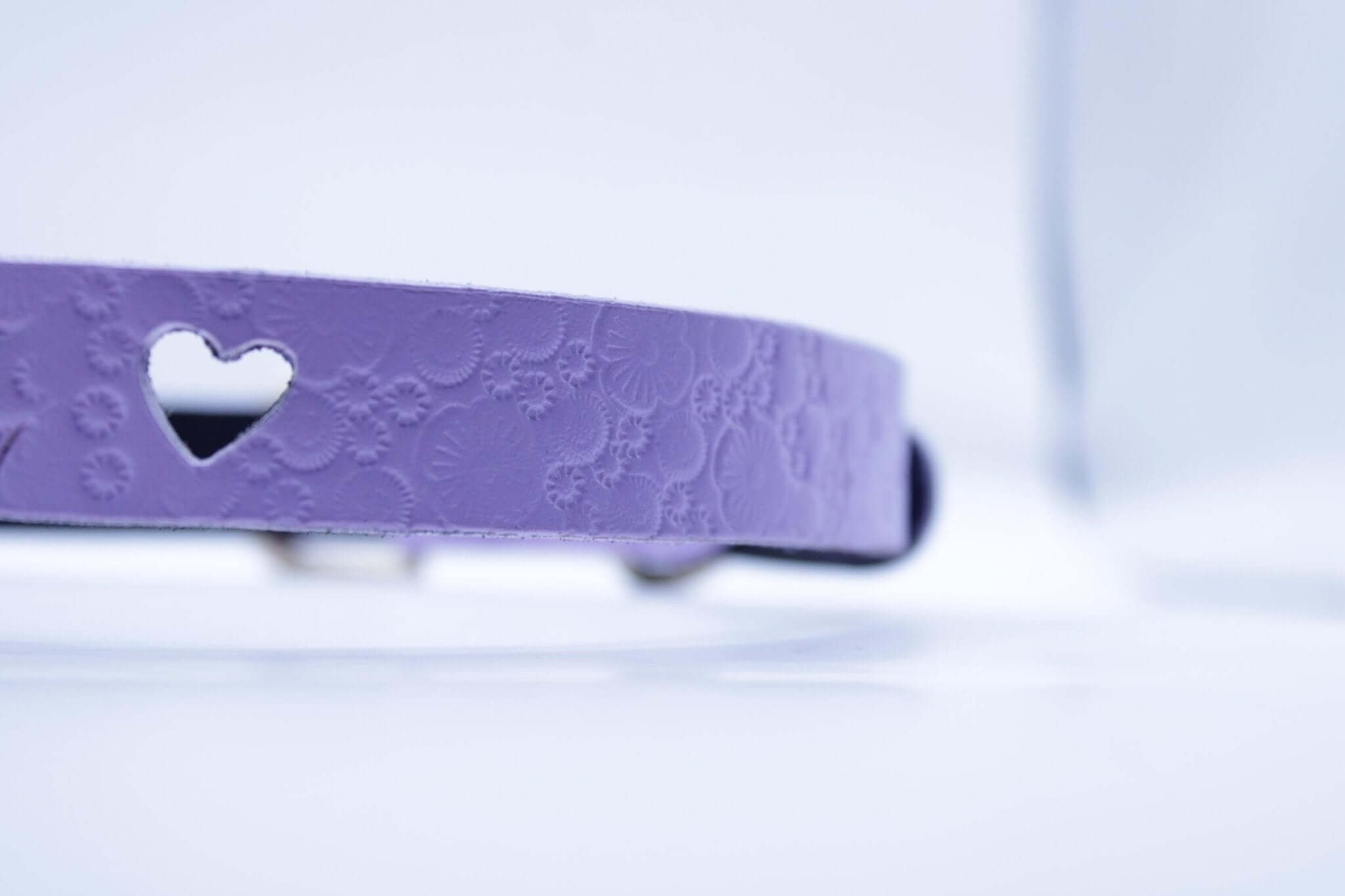 Lilac submissive collar with heart cutout, perfect for discreet day wear, BDSM jewelry and sexy bondage aesthetics.