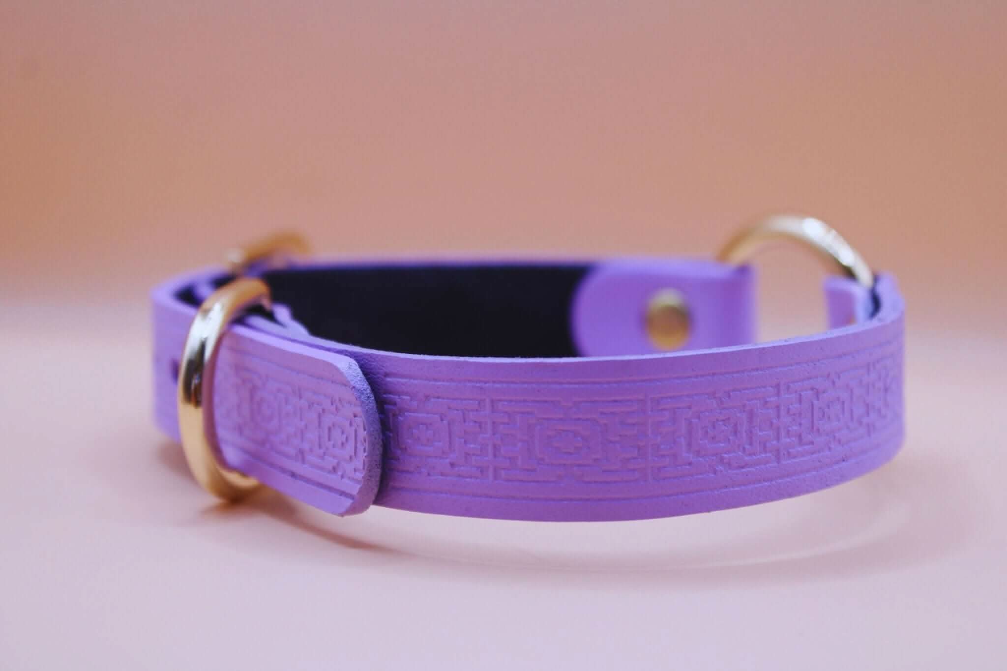Handmade lilac submissive collar with embossed geometric pattern and gold-toned hardware - perfect BDSM accessory.