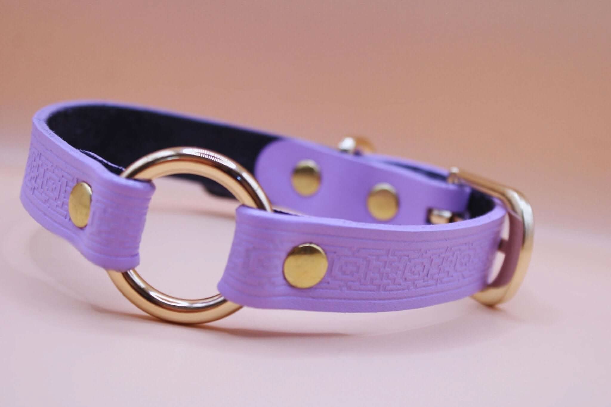 Handmade lilac submissive collar with embossed pattern and gold-toned hardware for BDSM and D/s gifts.