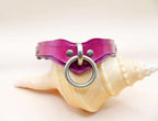 Magenta leather O-ring choker collar with silver accents, perfect for BDSM, bondage, and submissive jewelry