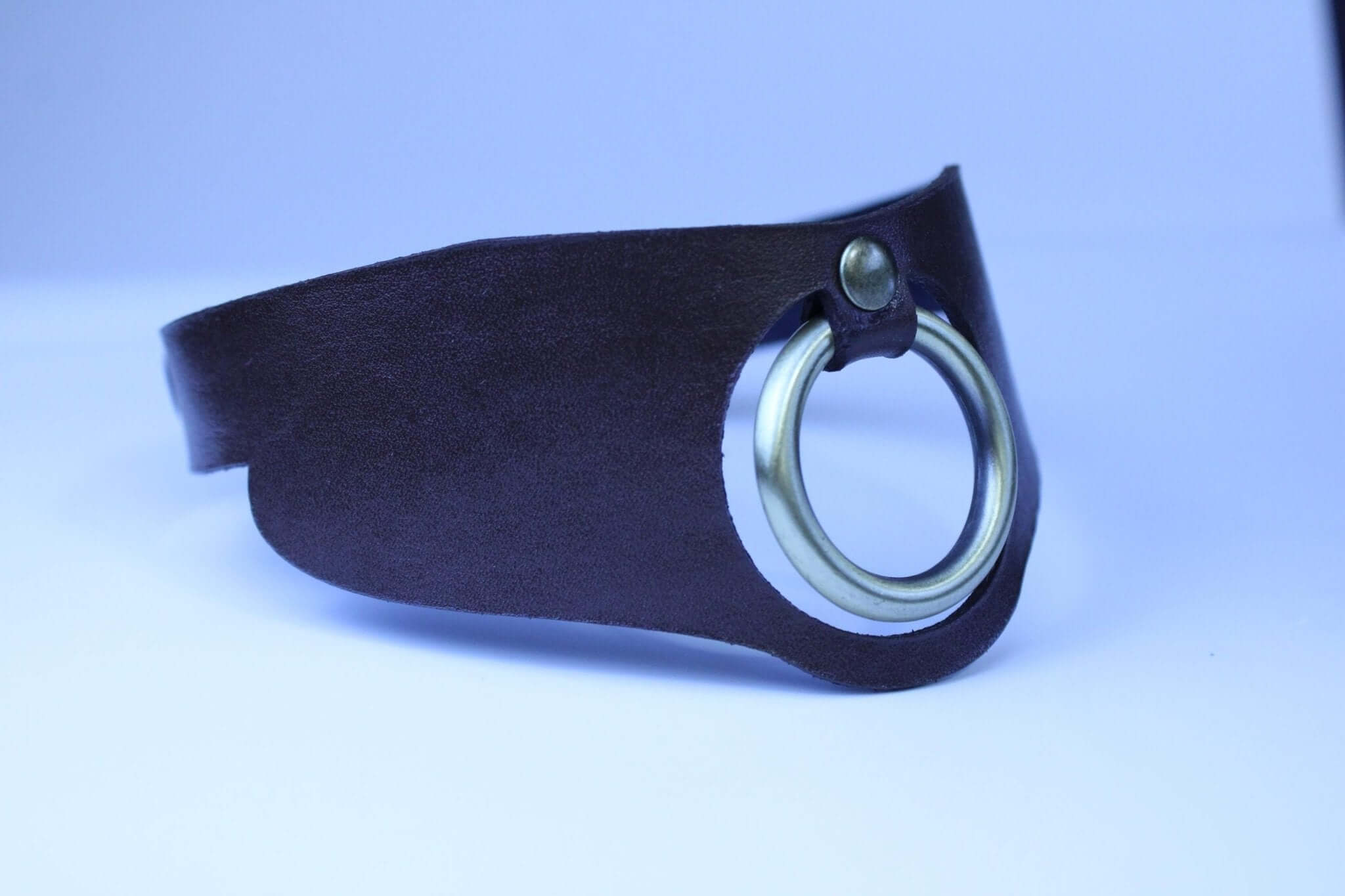 Minimalist leather posture collar with O-ring, perfect for BDSM jewelry and submissive day wear.