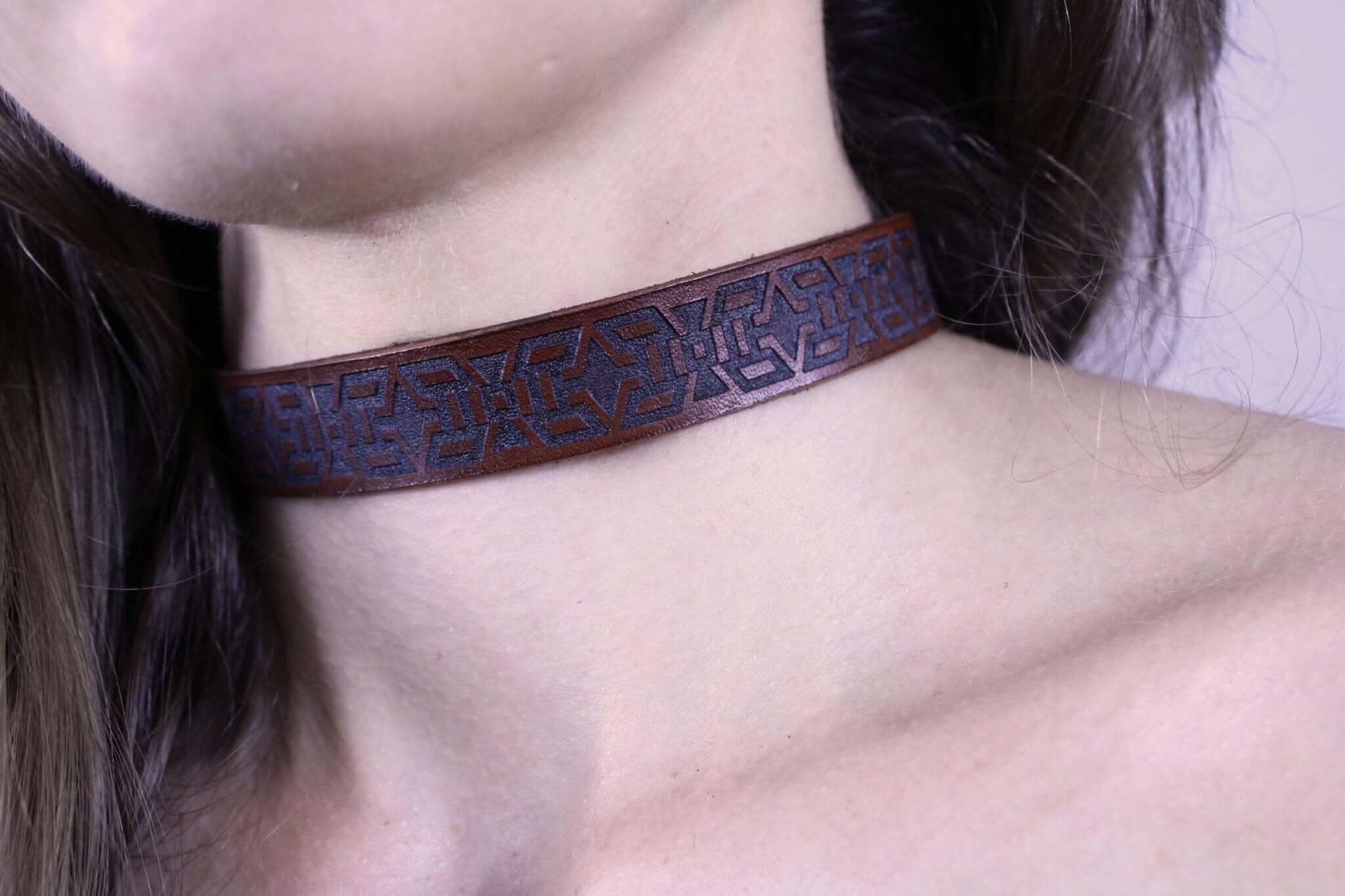Handmade minimalist BDSM collar featuring tribal geometric motif, ideal as a discreet day collar or submissive jewelry.