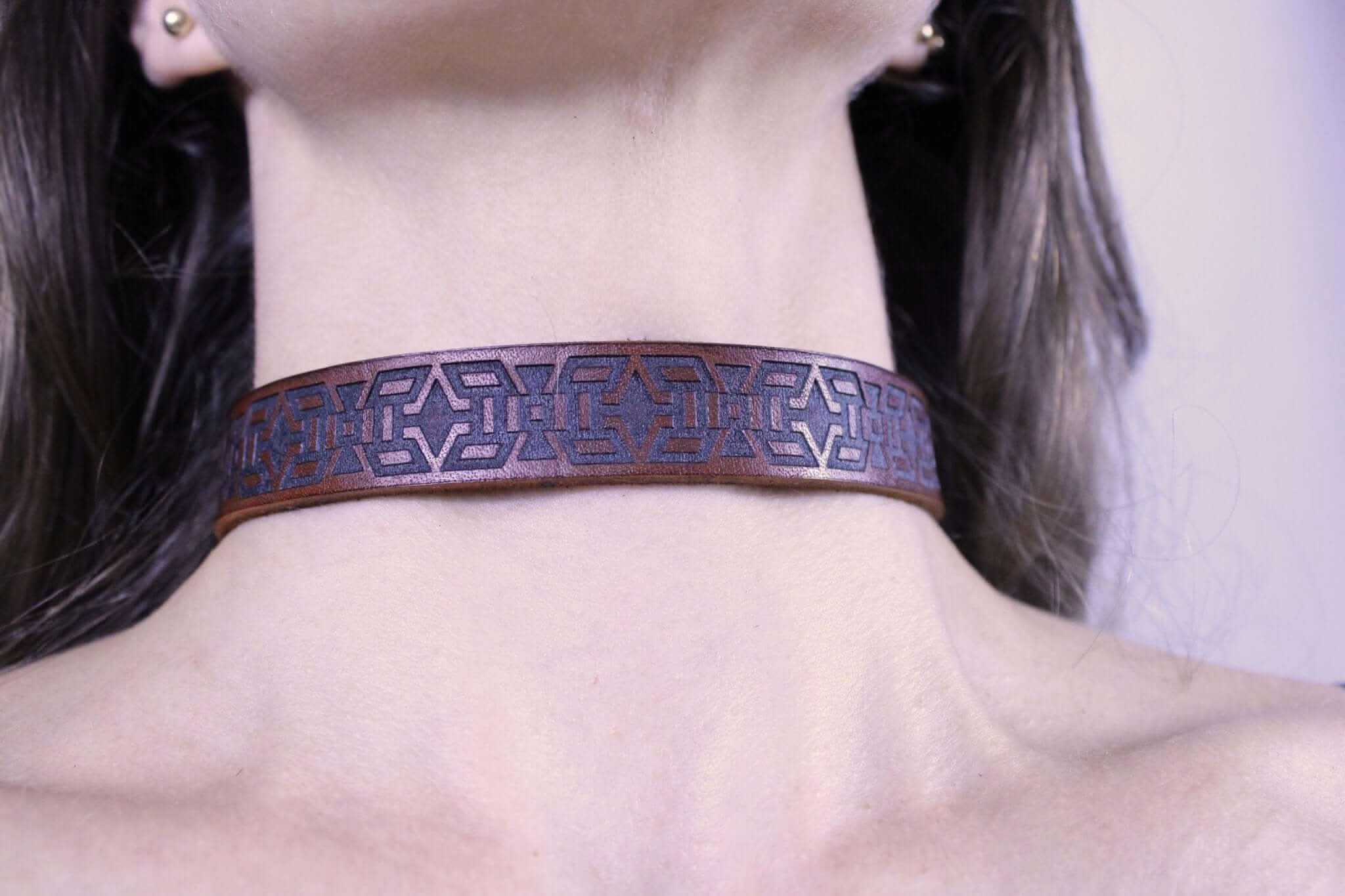 Handmade minimalist BDSM collar featuring tribal motif, perfect for sub jewelry and discreet day wear.