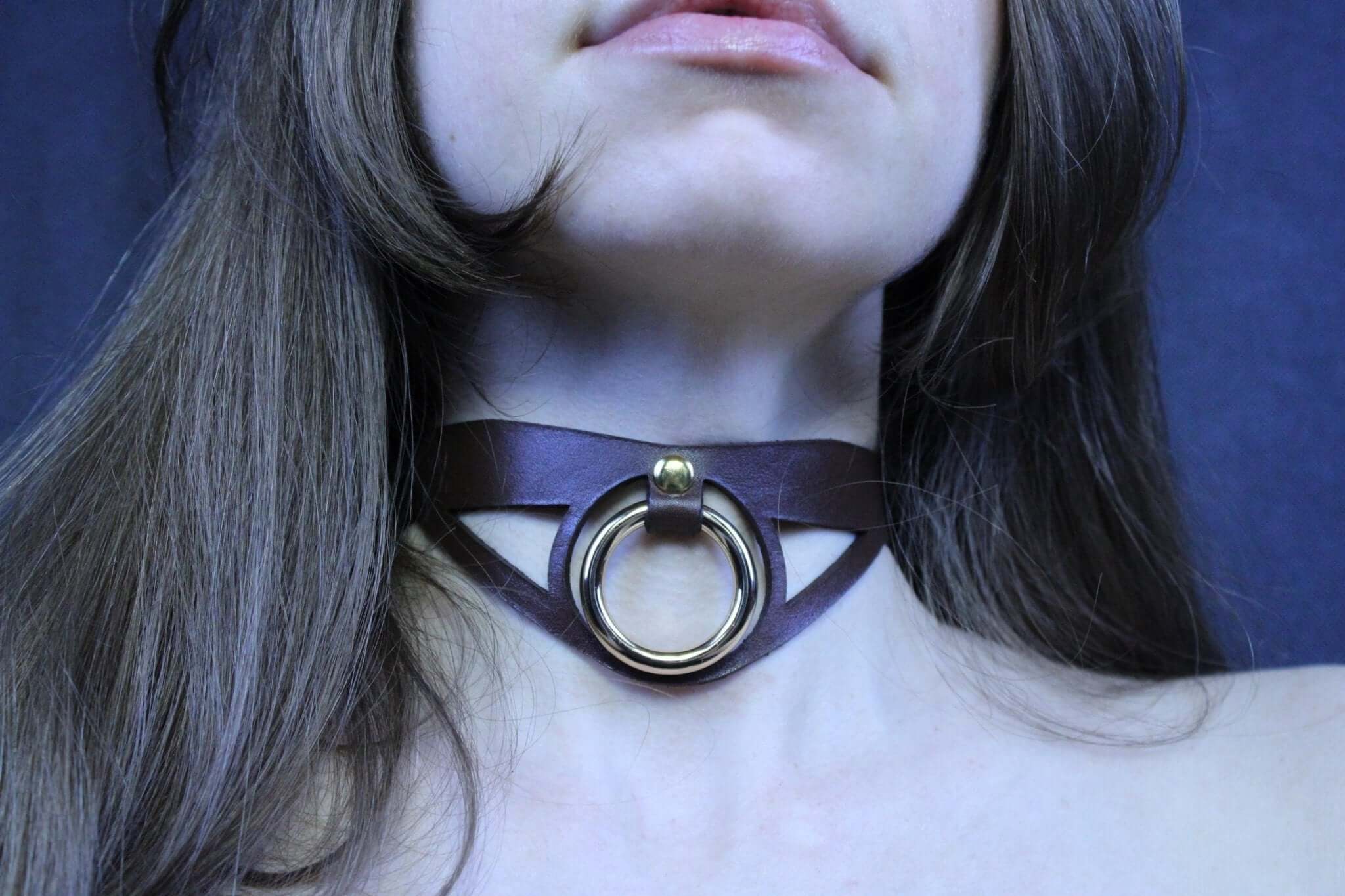Minimalist leather posture collar with bold O-ring, perfect for submissive jewelry and BDSM day collar use.
