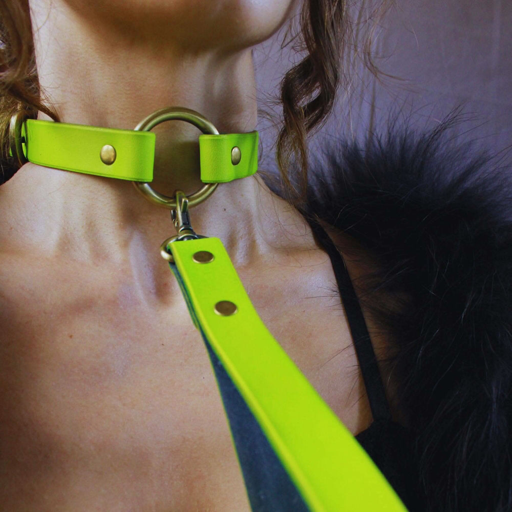 Bold neon green BDSM collar and leash set, perfect for submissive jewelry and discreet play. Ideal for bondage dynamics.