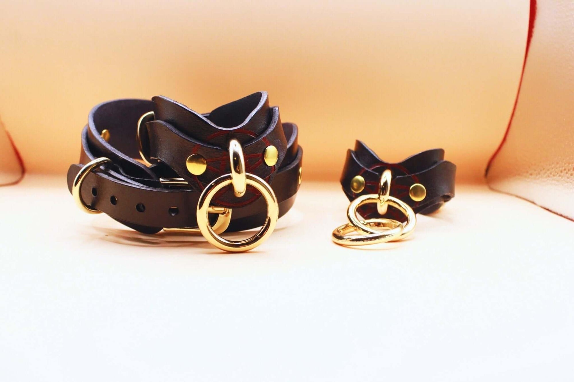 Pentagram BDSM collar set with gold hardware, perfect for submissive jewelry and bondage gear.