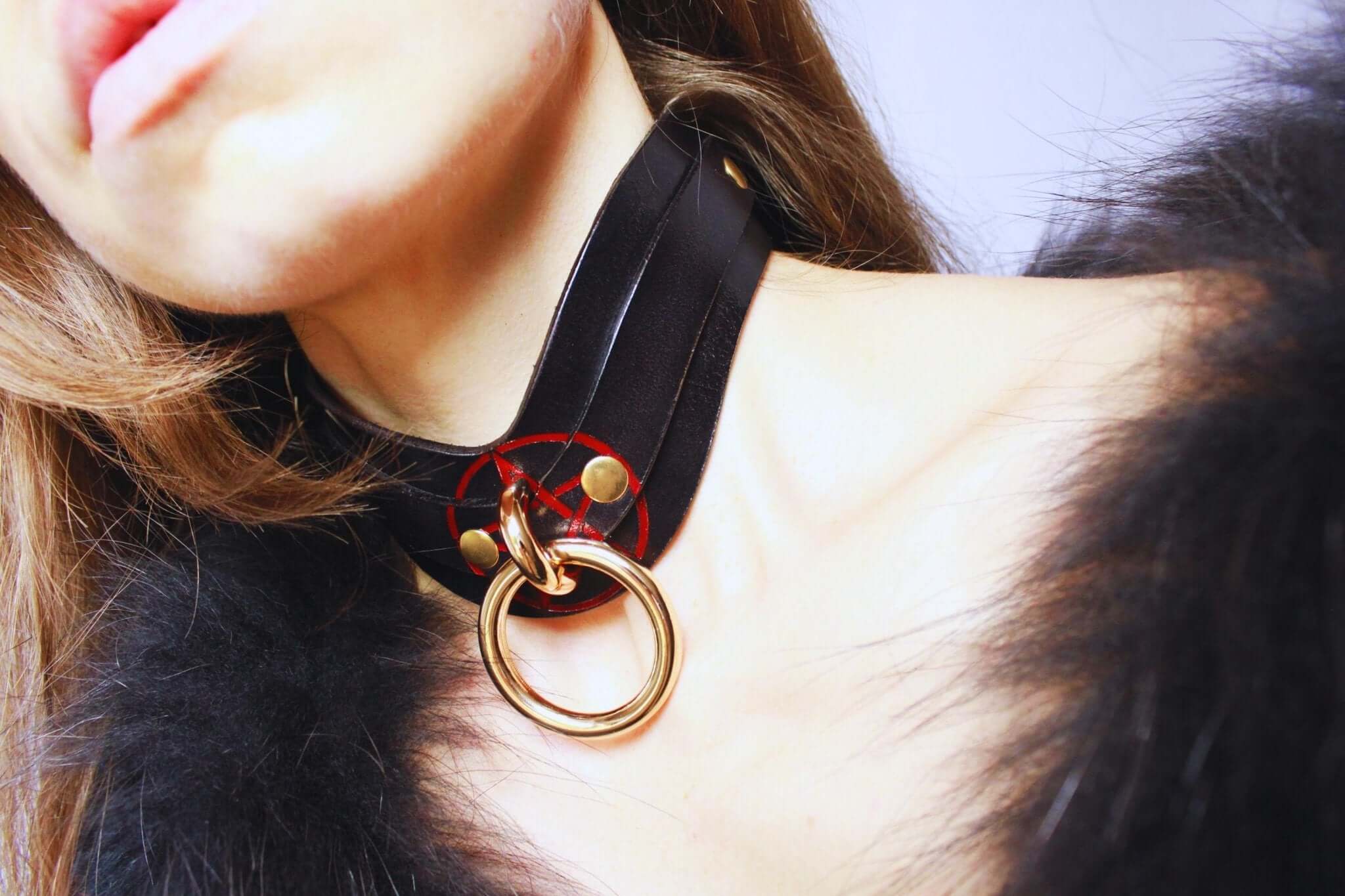 Stylish BDSM collar with gold ring and leather detail, perfect for discreet day wear or as a submissive accessory.