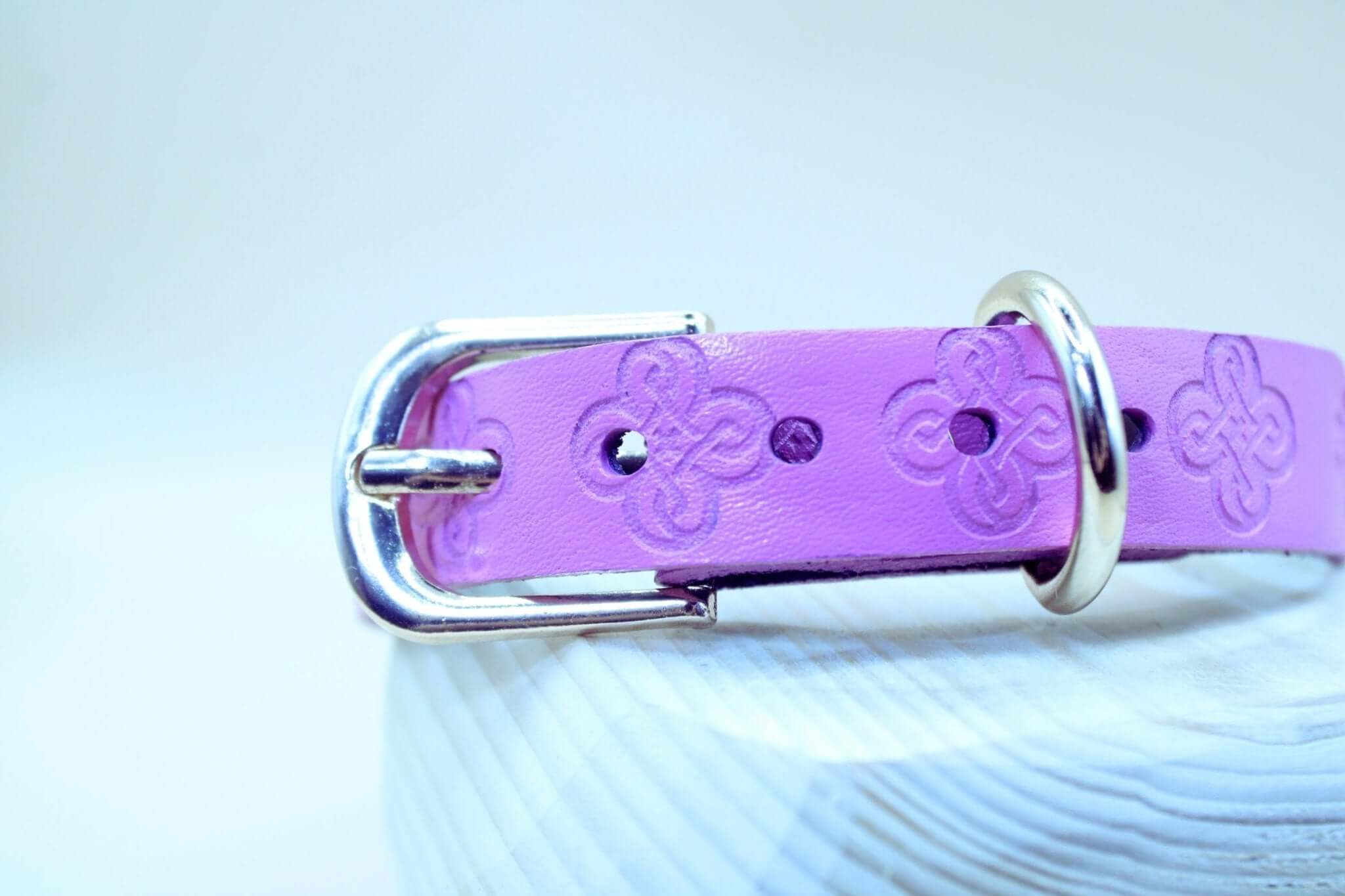 Pink BDSM collar with O-ring, handcrafted leather, ideal for submissive jewelry and bondage gear.