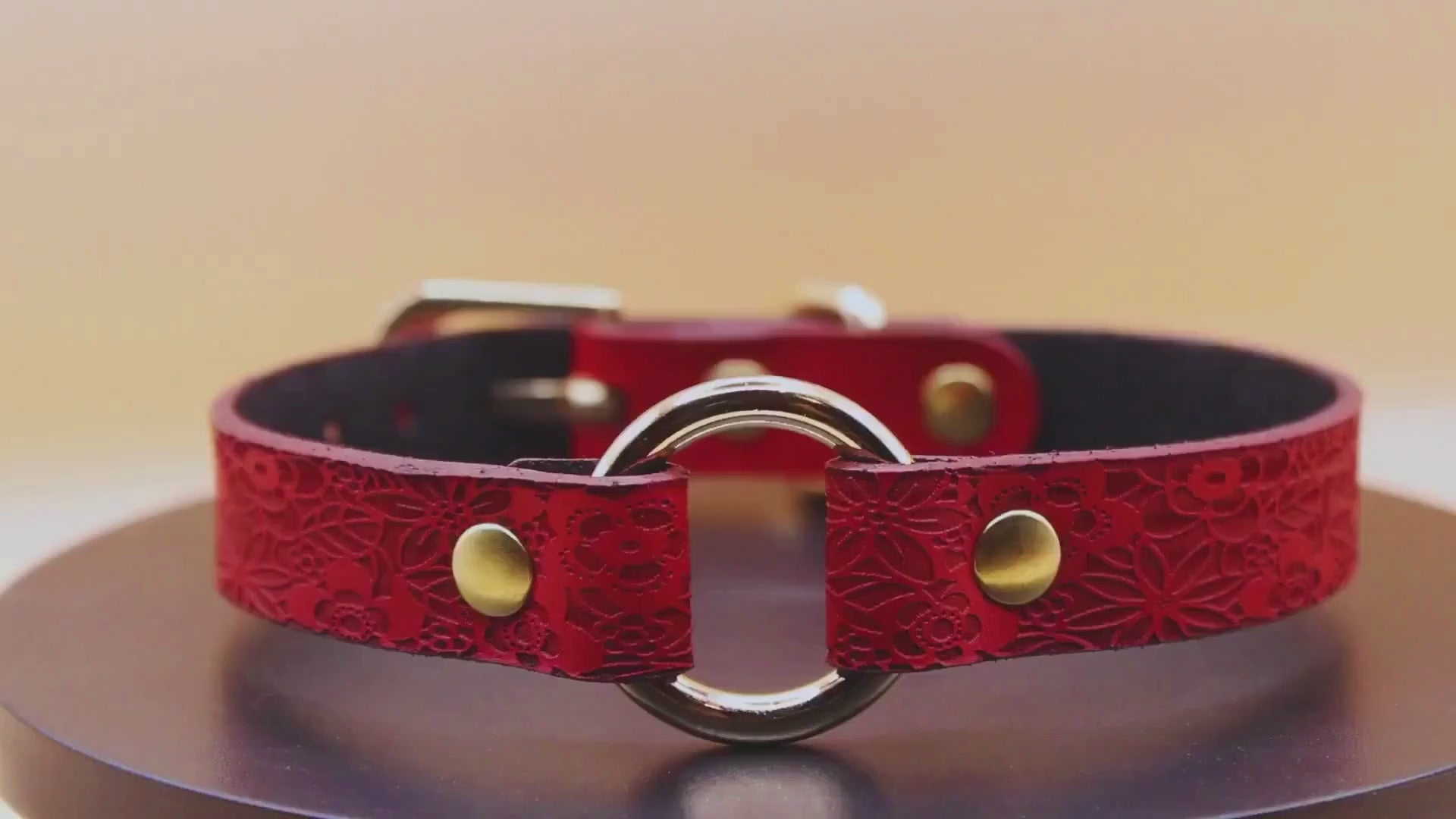 Handcrafted red BDSM collar with floral embossing and O-ring
