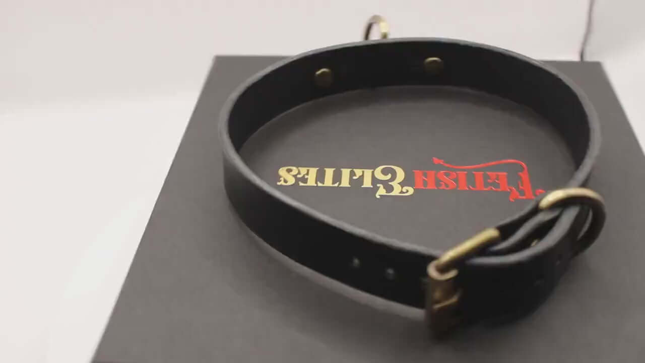 Minimalist black leather choker collar, perfect for discreet daywear and bdsm style. Submissive jewelry for elegant domination.