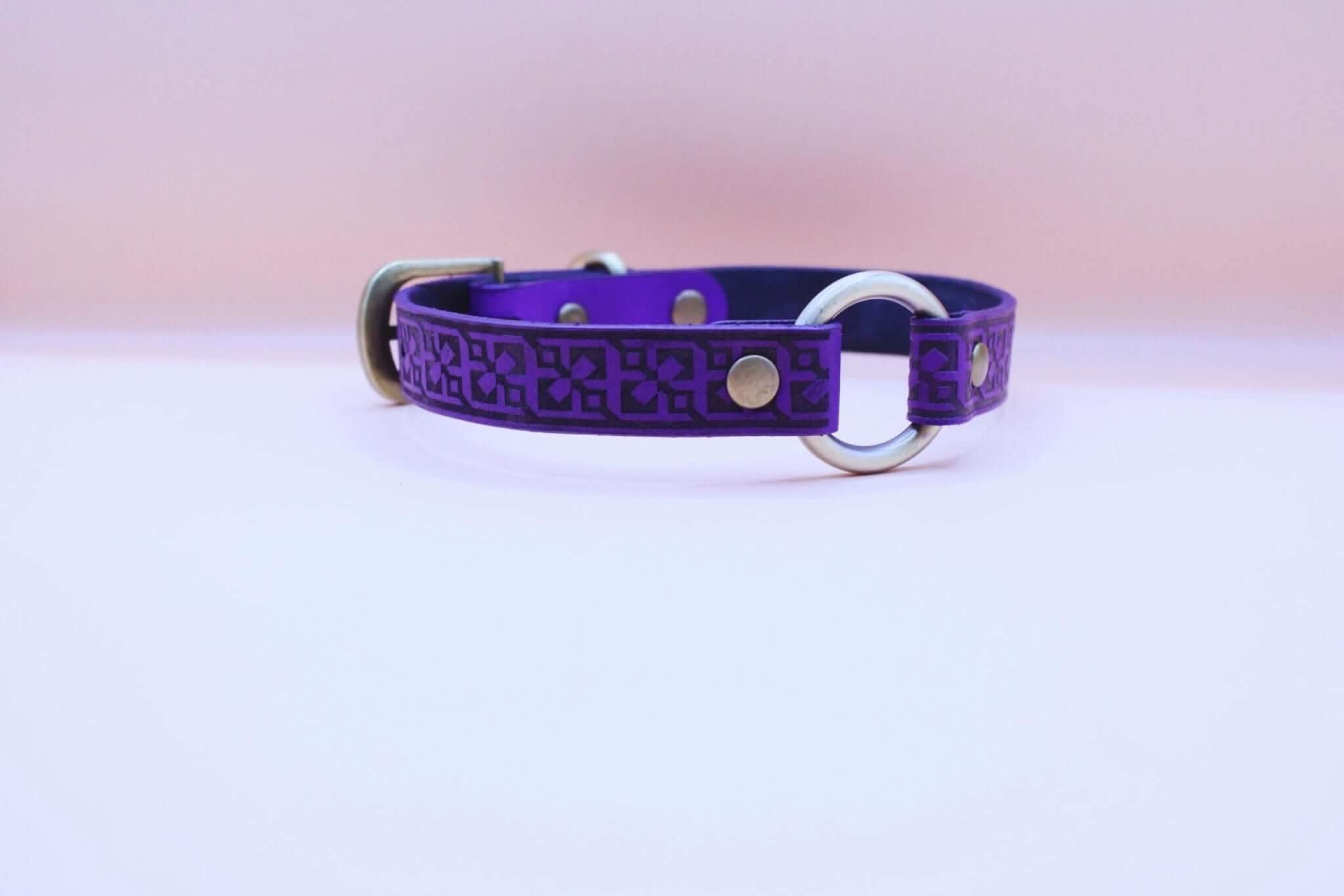 Handmade purple leather BDSM collar with O-ring, a perfect accessory for submissive jewelry and bondage gear.