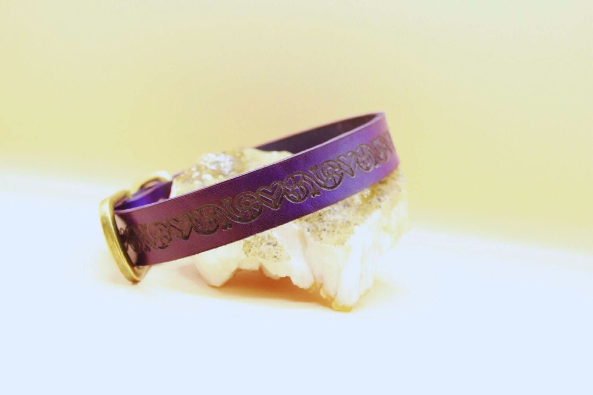 Purple BDSM collar with intricate design, ideal for submissive jewelry and discreet day wear, made of soft leather.