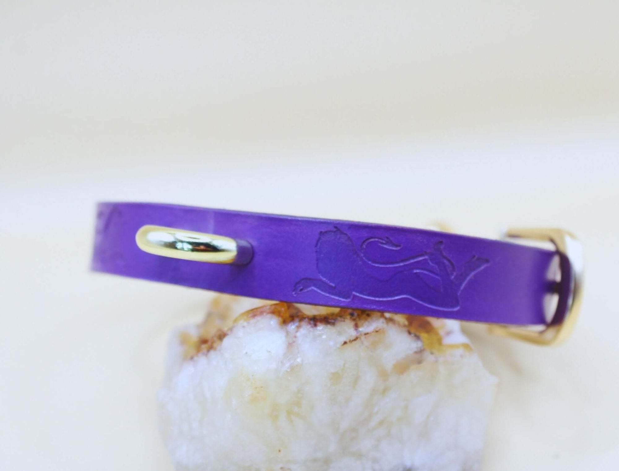 Handcrafted purple BDSM collar showcasing elegance, perfect for submissive jewelry and discreet day collar.
