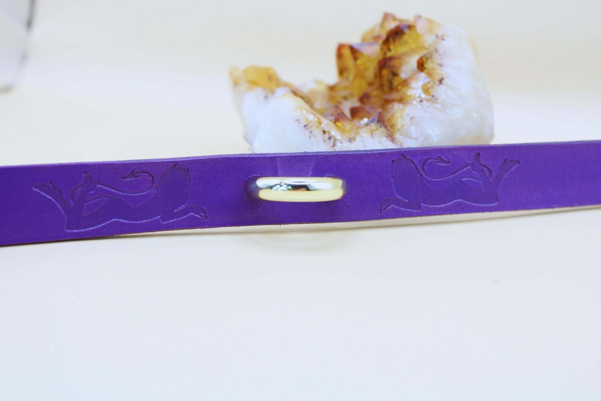 Purple BDSM collar with elegant engraving, perfect as a submissive accessory or discreet day collar for self-expression.