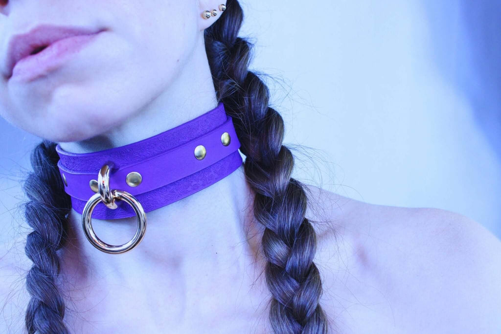 Purple floral submissive collar with O-ring, perfect for bondage style and BDSM jewelry.