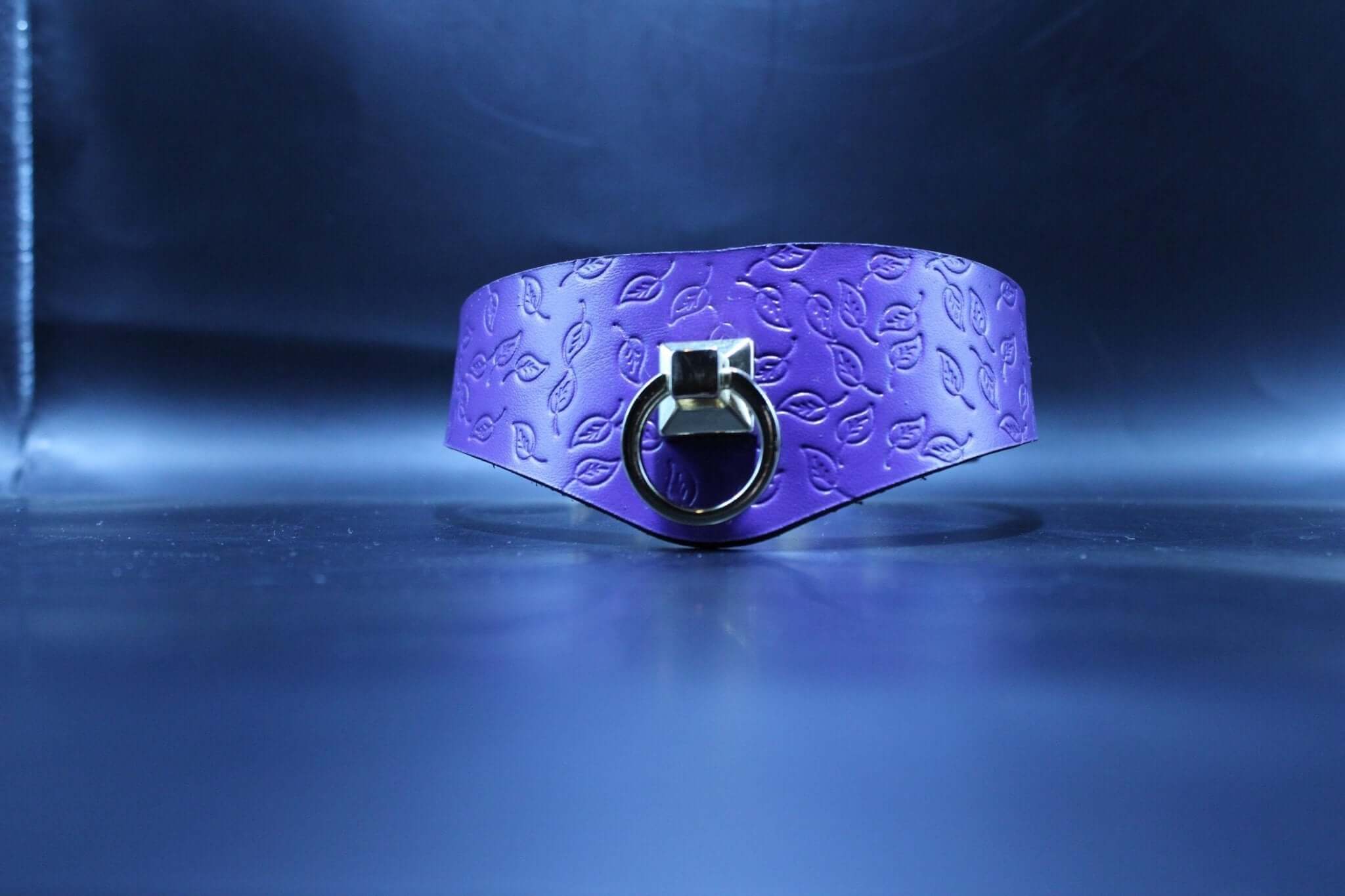 Purple Leaf BDSM collar featuring embossed design and D-ring, perfect for submissive jewelry and bondage gear.