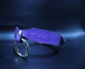 Elegant purple leaf BDSM collar with O-ring, a stylish submissive jewelry piece for bondage enthusiasts.