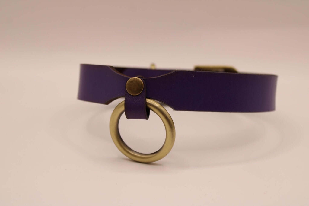 Purple leather submissive collar with metal ring, perfect for BDSM and sensual aesthetics.
