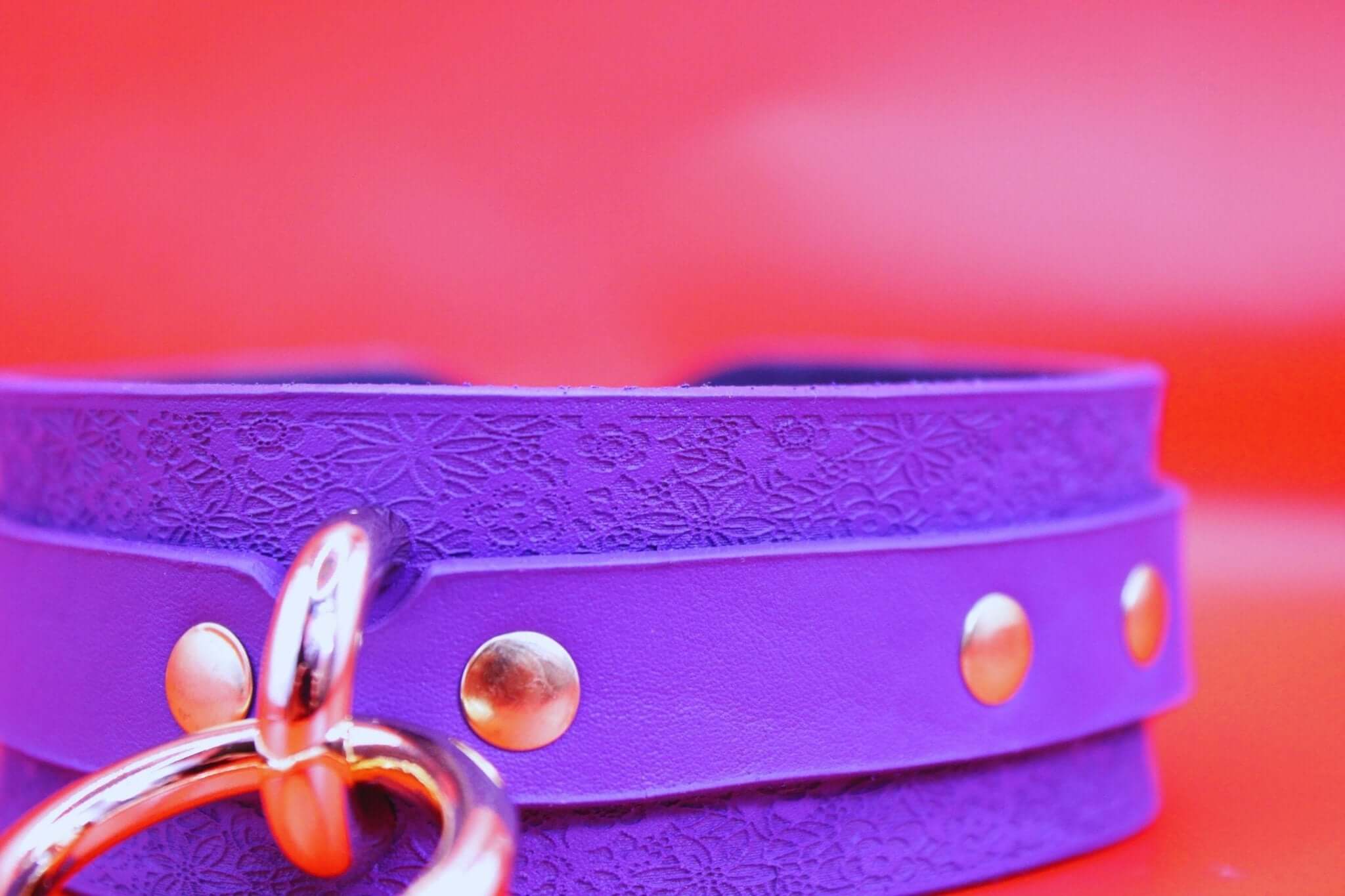 Purple leather choker collar with gold studs, perfect as a discreet day collar in BDSM jewelry and fashion.