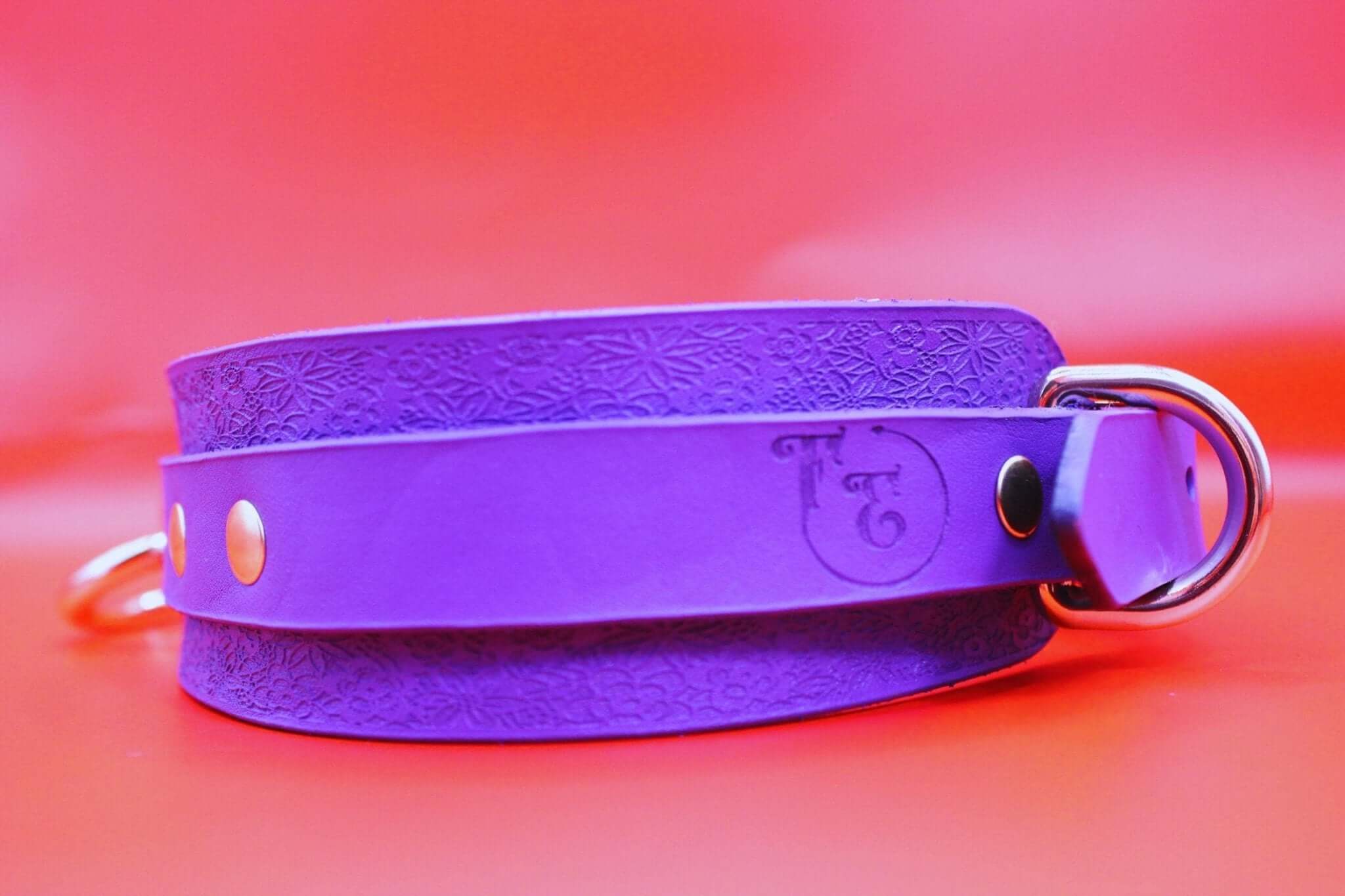 Purple leather choker collar designed for BDSM, perfect as a discreet day collar or submissive jewelry.