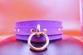 Elegant purple leather choker collar with ring detail, perfect for BDSM, bondage, and discreet day wear.