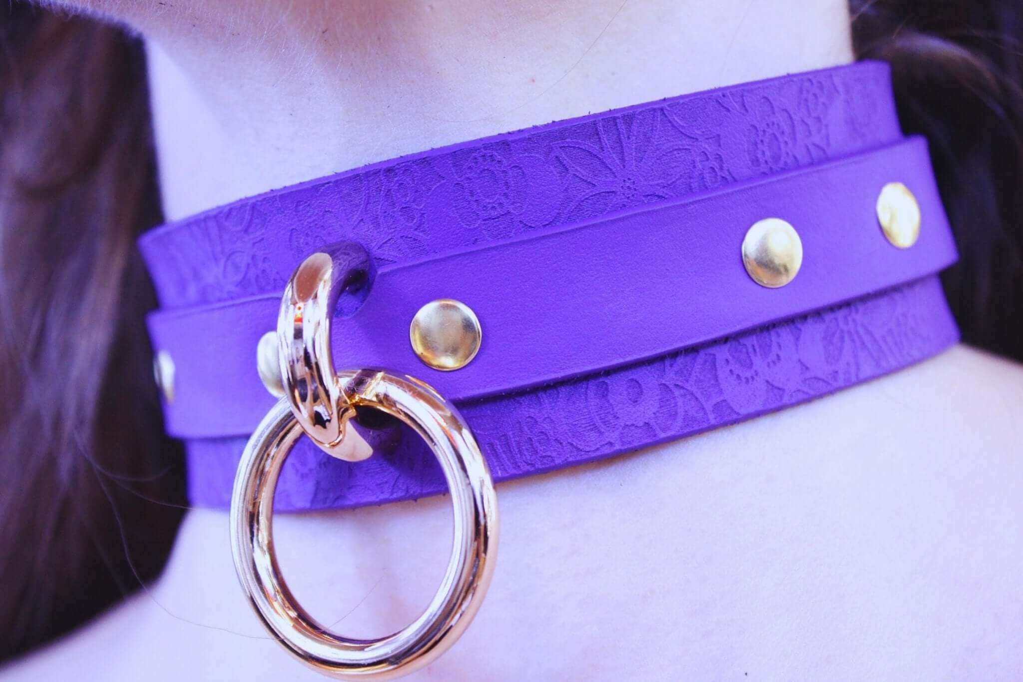Purple leather choker with gold studs and ring, perfect for BDSM, discreet day collar, and submissive jewelry.