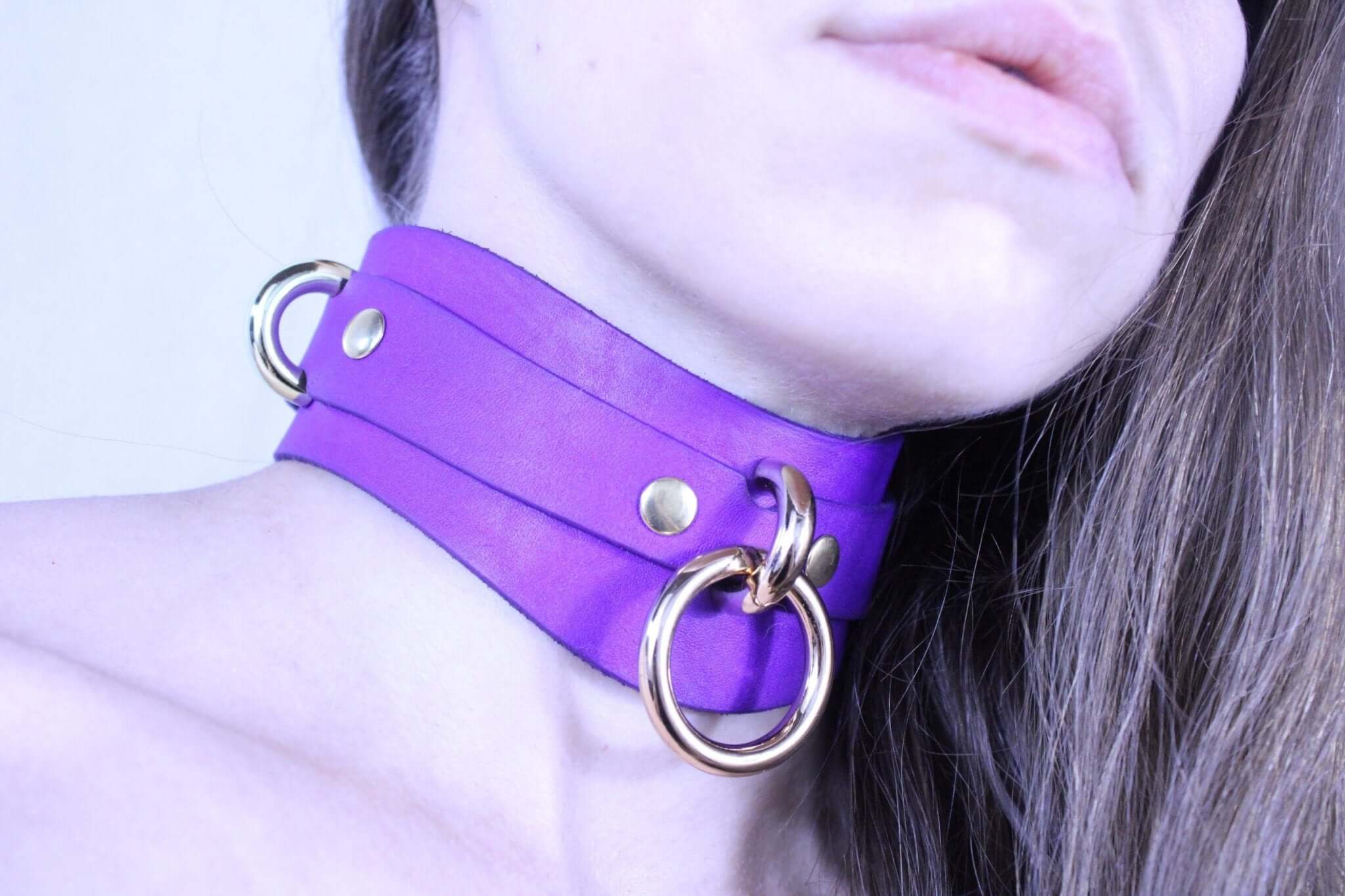 Purple Posture Collar with gold hardware, a luxurious submissive jewelry piece for BDSM and D/s lifestyles.