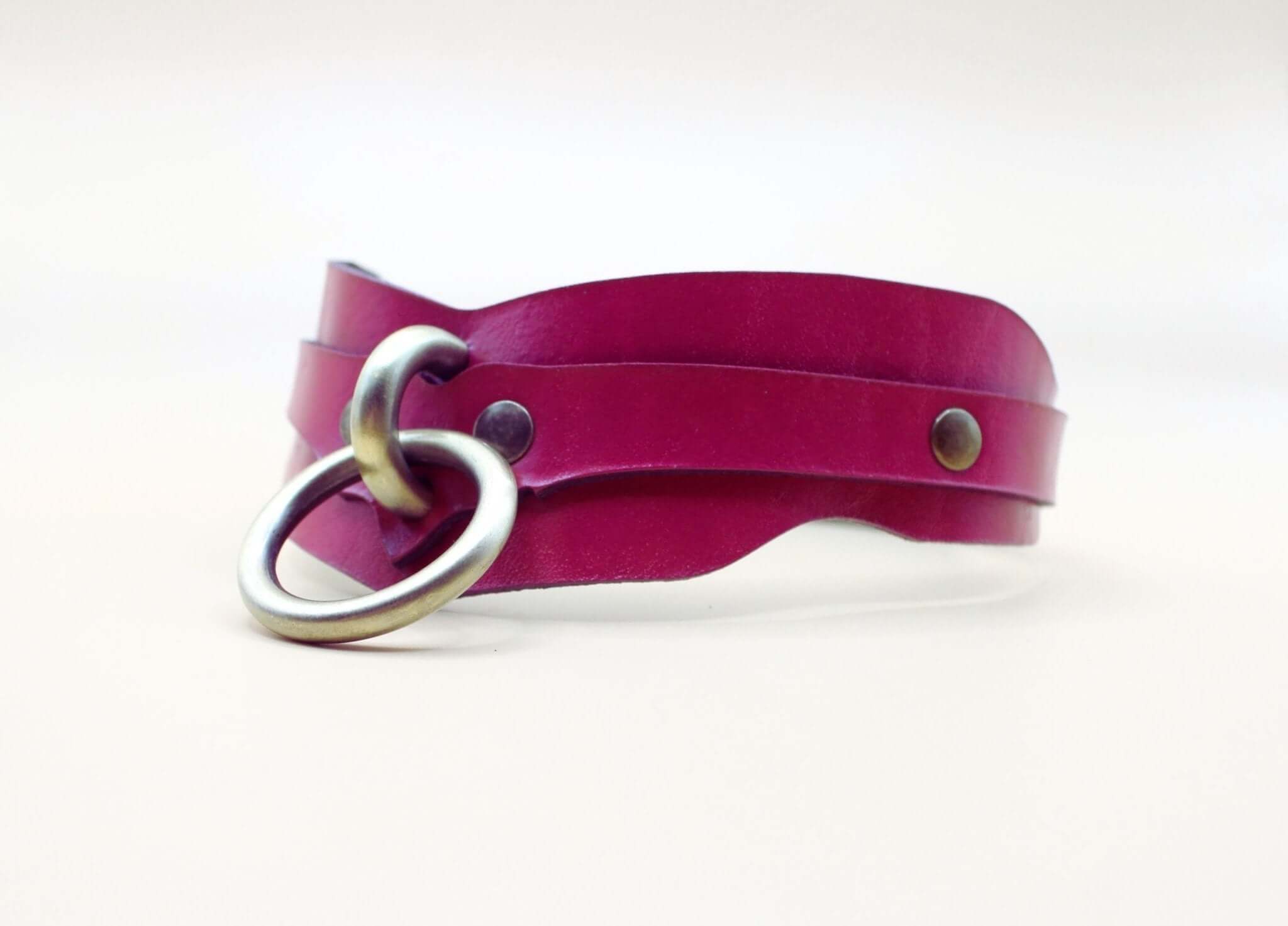 Raspberry BDSM collar with O-ring, double strap design. Ideal submissive jewelry for bondage and DDLG enthusiasts.
