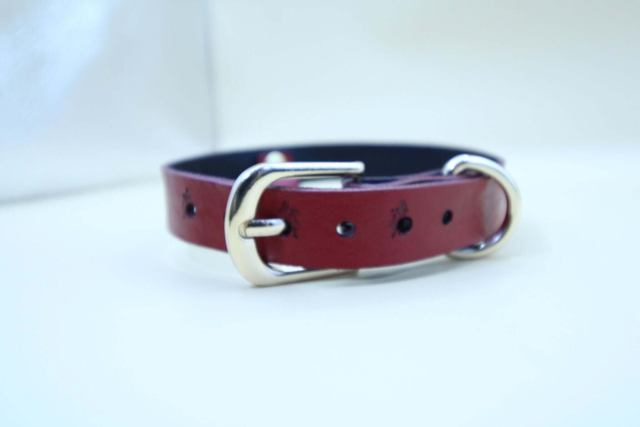 Handmade red leather submissive collar featuring a sleek design and O-ring, ideal for BDSM and bondage enthusiasts.